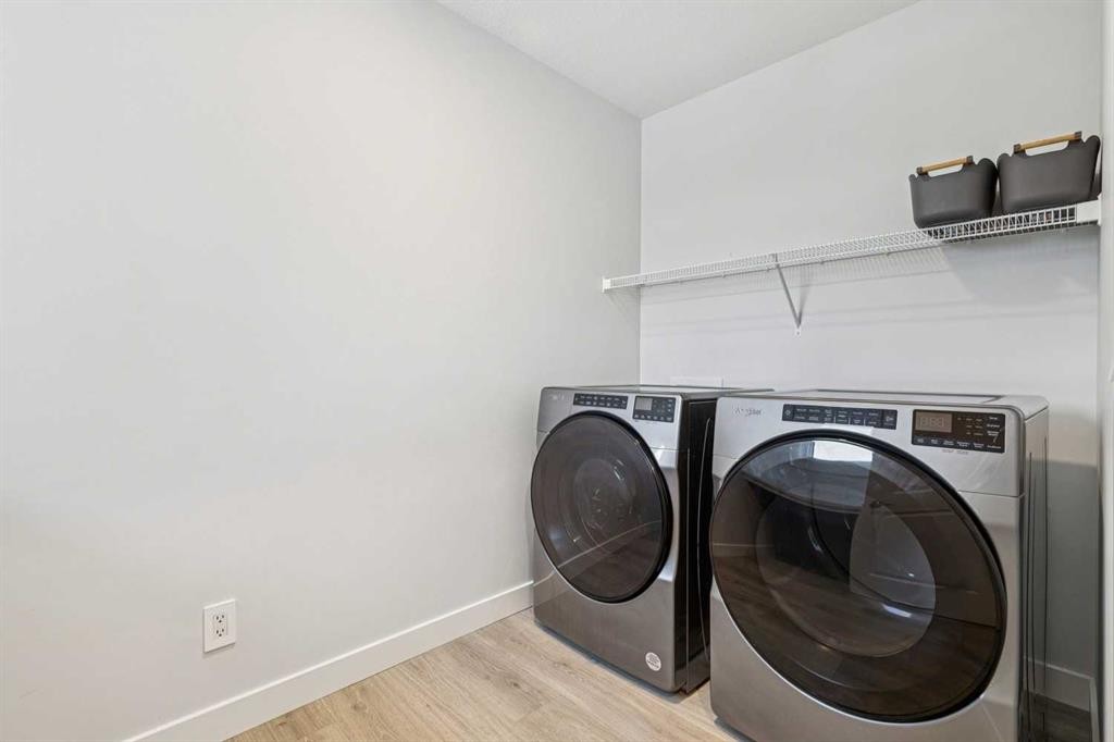 153 Edith Villas Nw, Calgary, AB - Indoor Photo Showing Laundry Room
