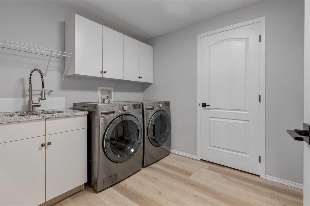 79 Discovery Ridge Park Sw, Calgary, AB - Indoor Photo Showing Laundry Room