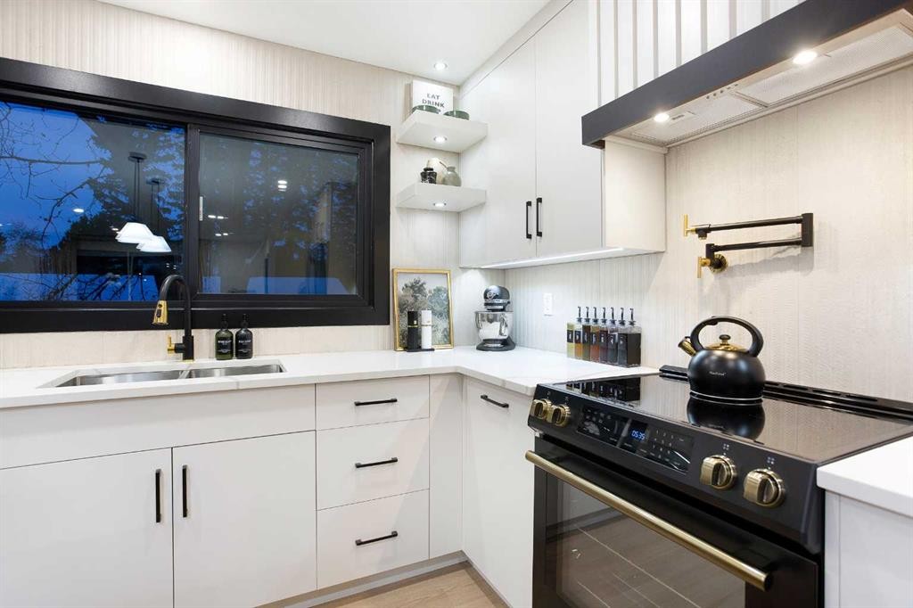 2416 Palliser Drive Sw, Calgary, AB - Indoor Photo Showing Kitchen With Double Sink