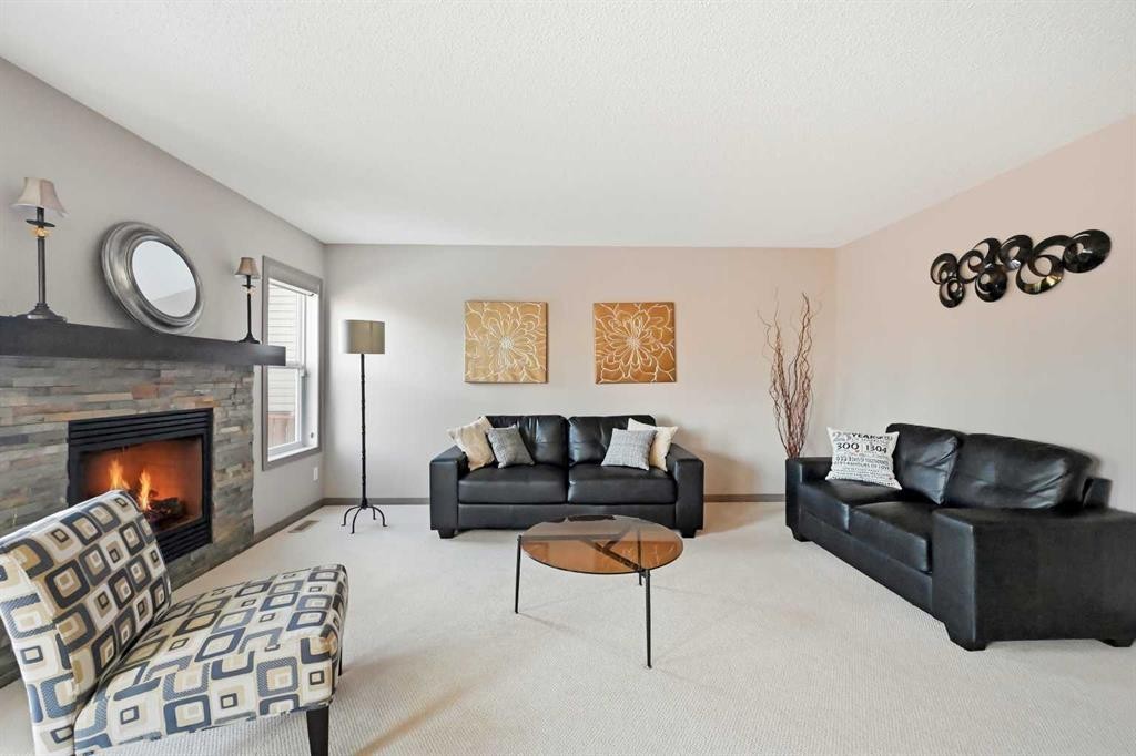 28 Skyview Shores Terrace Ne, Calgary, AB - Indoor Photo Showing Living Room With Fireplace