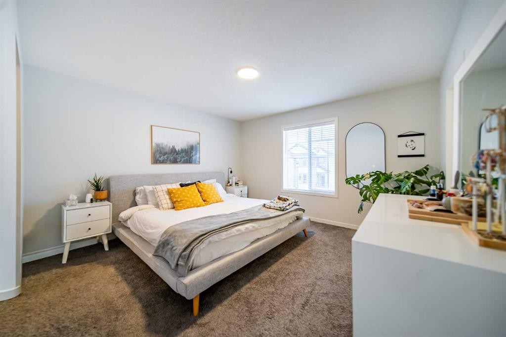 27 Iris Crescent, Okotoks, AB - Indoor Photo Showing Bedroom