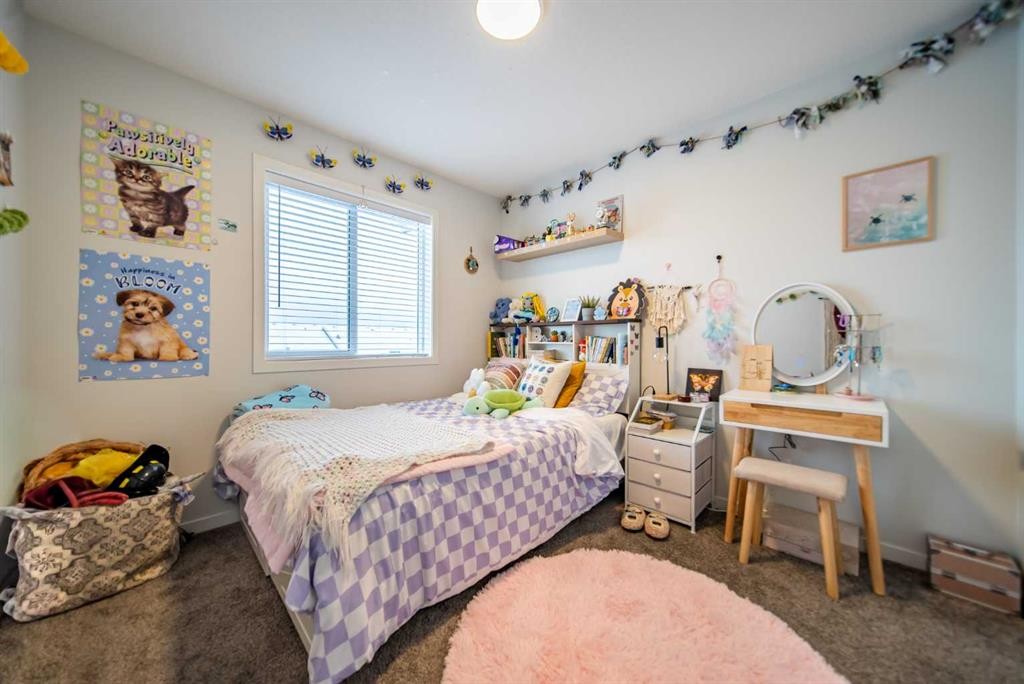 27 Iris Crescent, Okotoks, AB - Indoor Photo Showing Bedroom