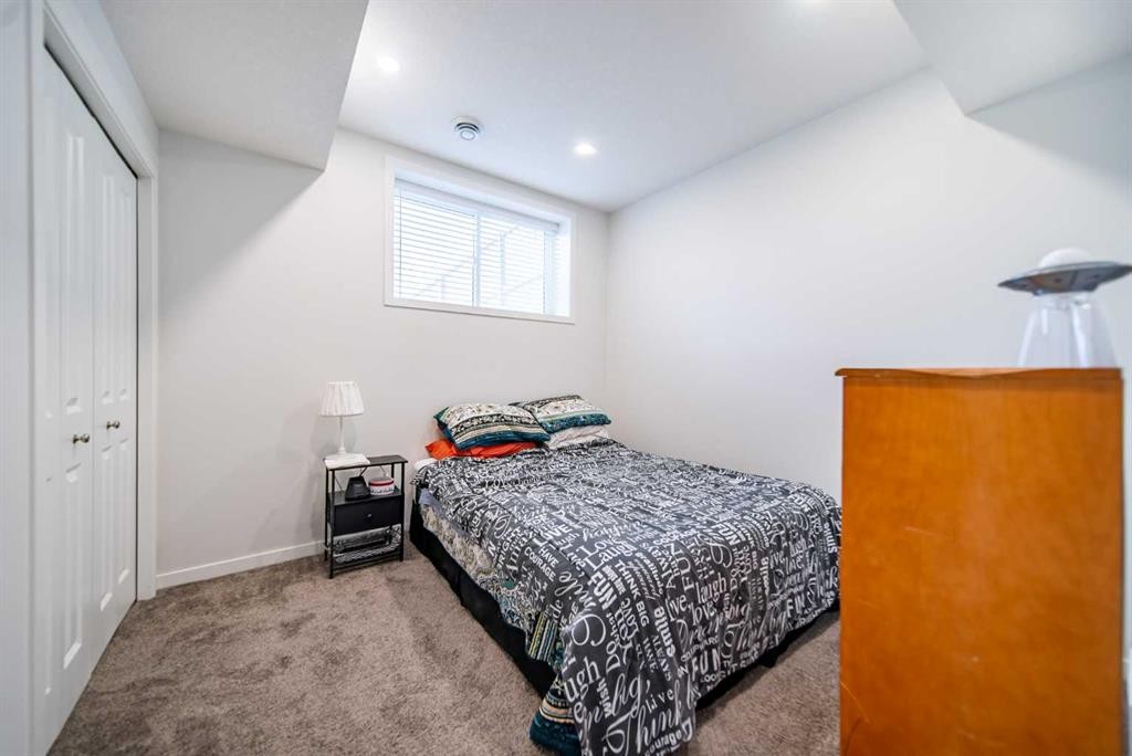 27 Iris Crescent, Okotoks, AB - Indoor Photo Showing Bedroom