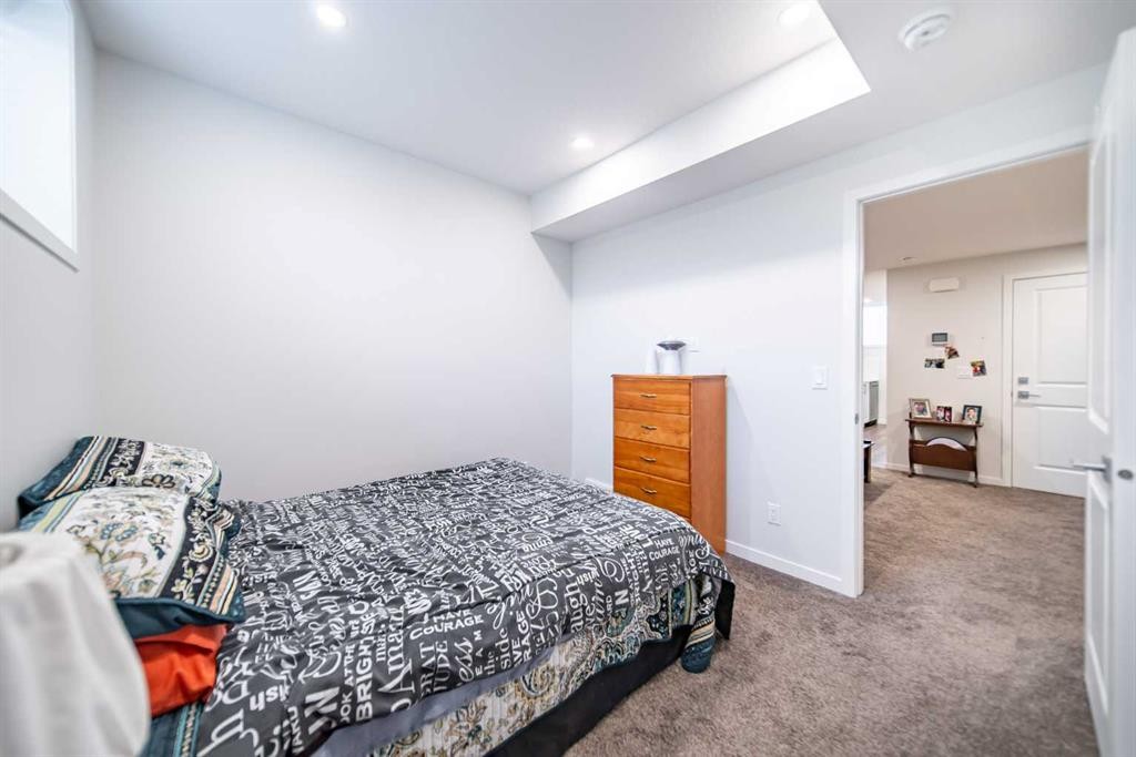 27 Iris Crescent, Okotoks, AB - Indoor Photo Showing Bedroom