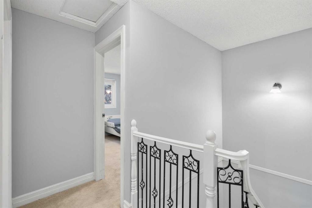 15-200 Shawnessy Drive Sw, Calgary, AB - Indoor Photo Showing Other Room