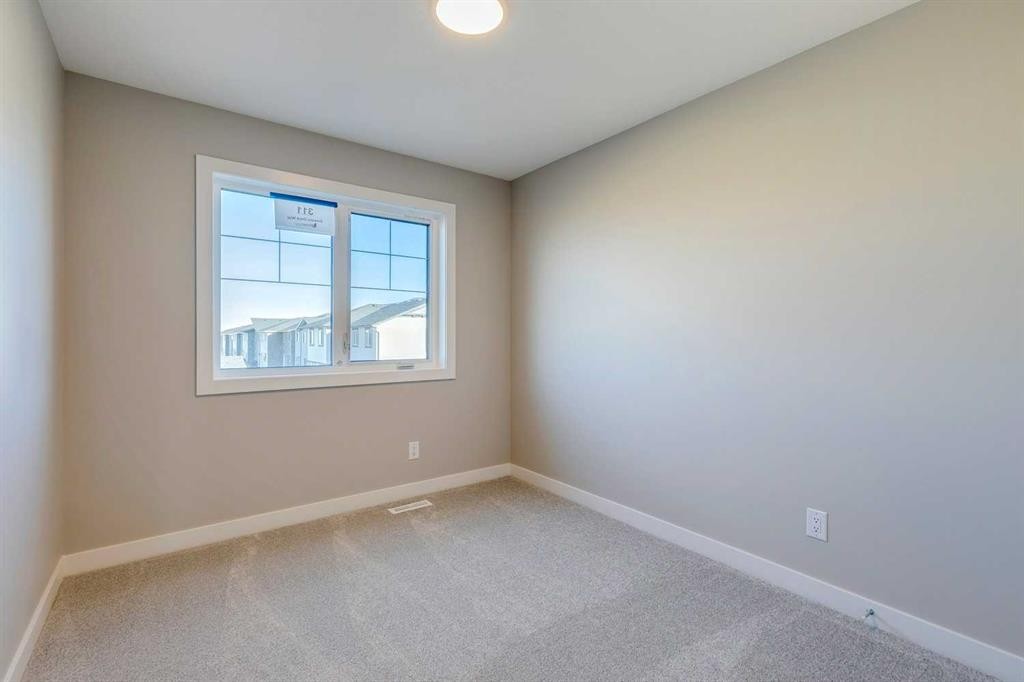 311 Dawson Dock Way, Chestermere, AB - Indoor Photo Showing Other Room