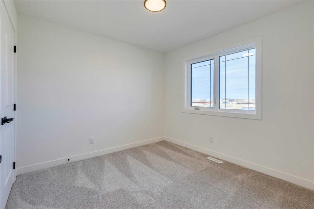 307 Dawson Dock Way, Chestermere, AB - Indoor Photo Showing Other Room