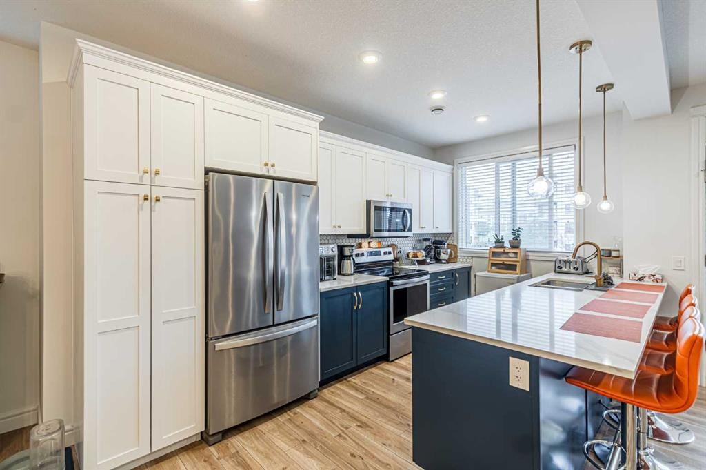 4307 Seton Drive Se, Calgary, AB - Indoor Photo Showing Kitchen With Stainless Steel Kitchen With Upgraded Kitchen