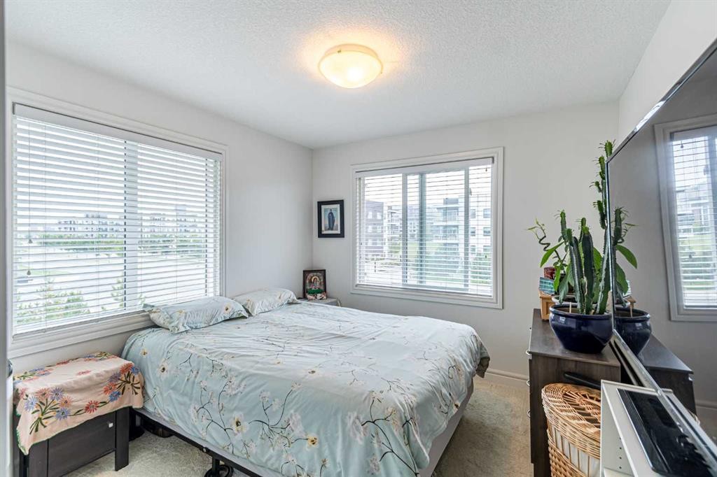 4307 Seton Drive Se, Calgary, AB - Indoor Photo Showing Bedroom