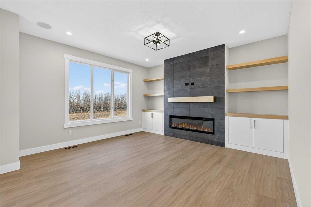 180 Wildrose Drive, Strathmore, AB - Indoor Photo Showing Living Room With Fireplace