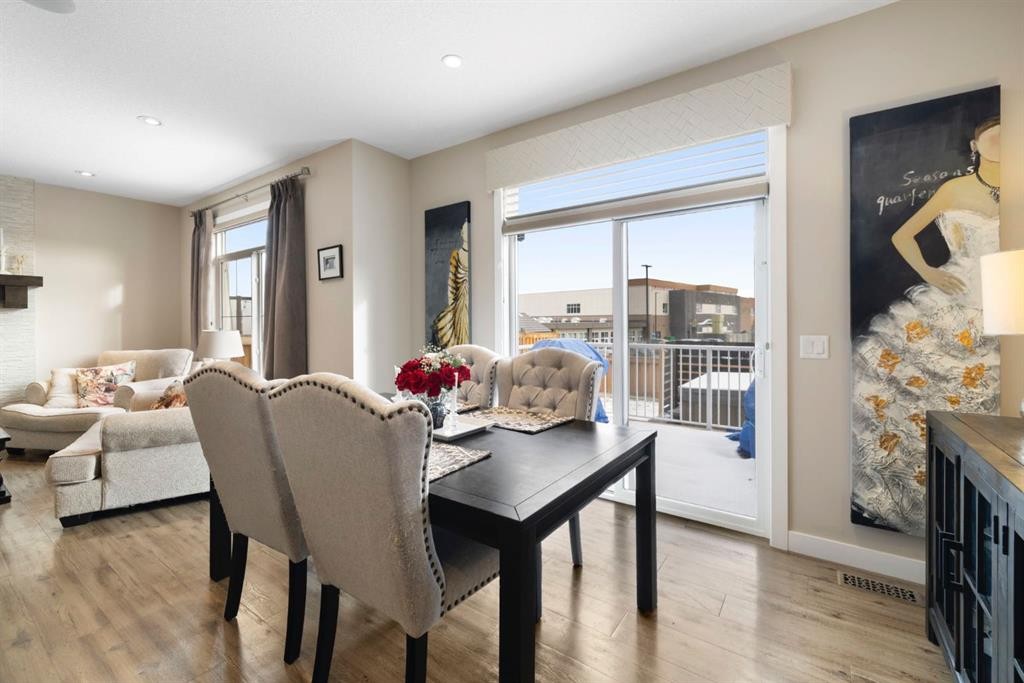 8 Emberside Glen, Cochrane, AB - Indoor With Fireplace