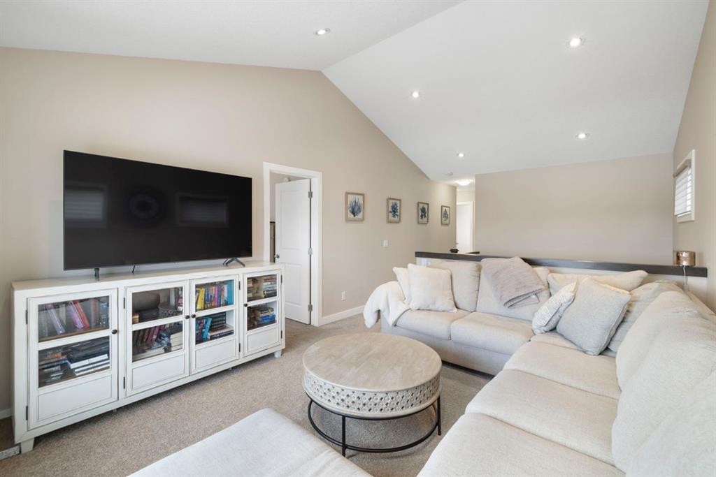 8 Emberside Glen, Cochrane, AB - Indoor Photo Showing Living Room