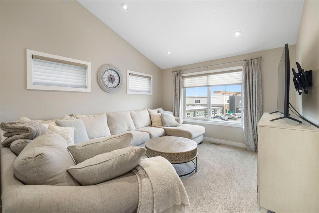 8 Emberside Glen, Cochrane, AB - Indoor Photo Showing Living Room