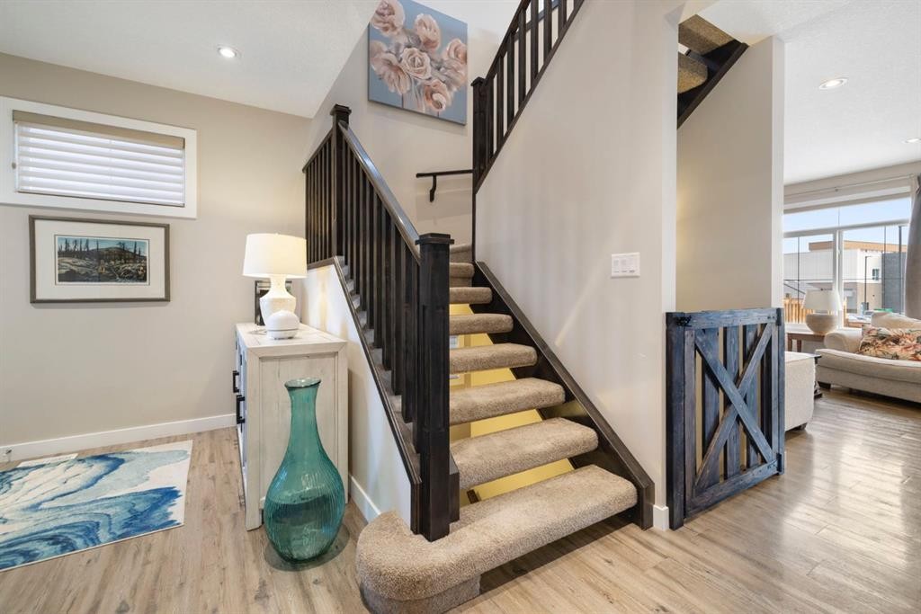 8 Emberside Glen, Cochrane, AB - Indoor Photo Showing Other Room