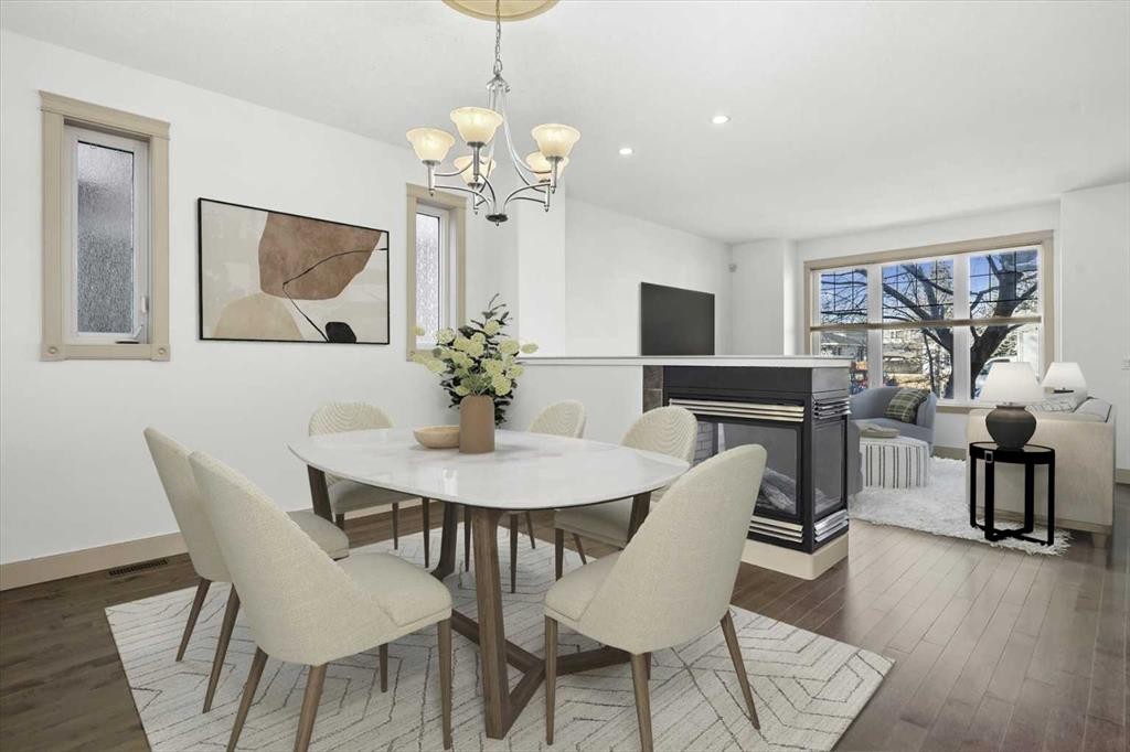 433 19 Avenue Ne, Calgary, AB - Indoor Photo Showing Dining Room With Fireplace