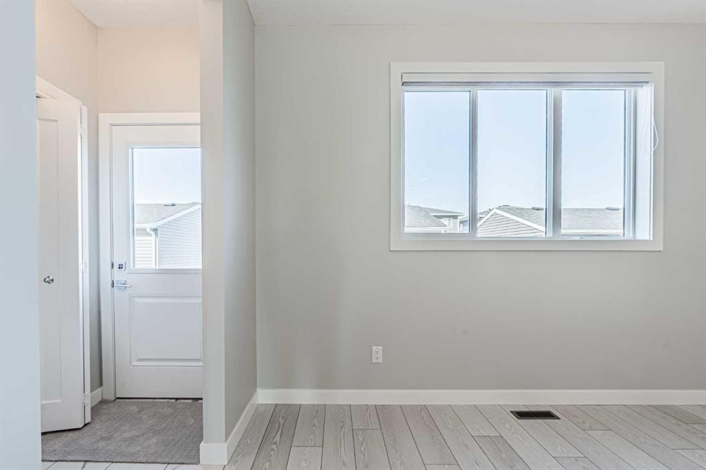 129 Dawson Wharf View, Chestermere, AB - Indoor Photo Showing Other Room
