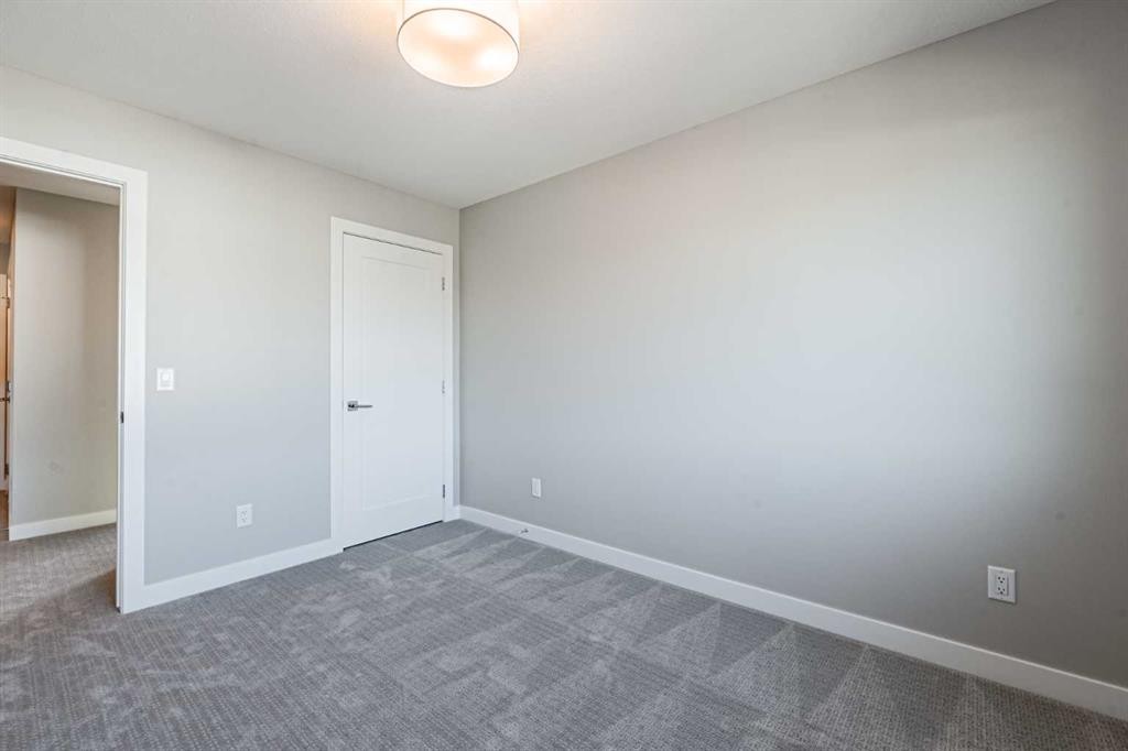 129 Dawson Wharf View, Chestermere, AB - Indoor Photo Showing Other Room