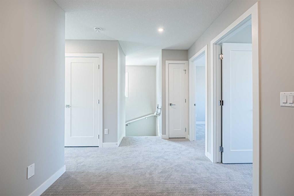 129 Dawson Wharf View, Chestermere, AB - Indoor Photo Showing Other Room