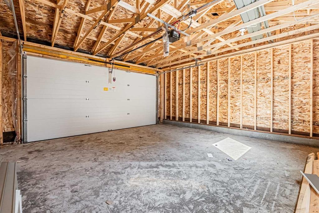129 Dawson Wharf View, Chestermere, AB - Indoor Photo Showing Garage