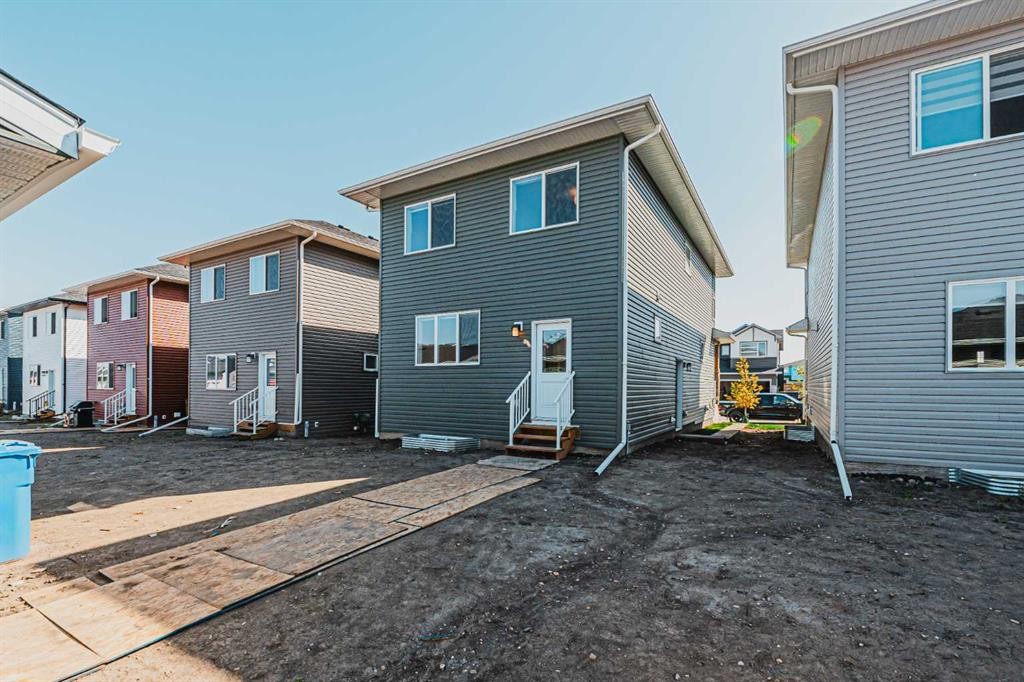 129 Dawson Wharf View, Chestermere, AB - Outdoor With Exterior