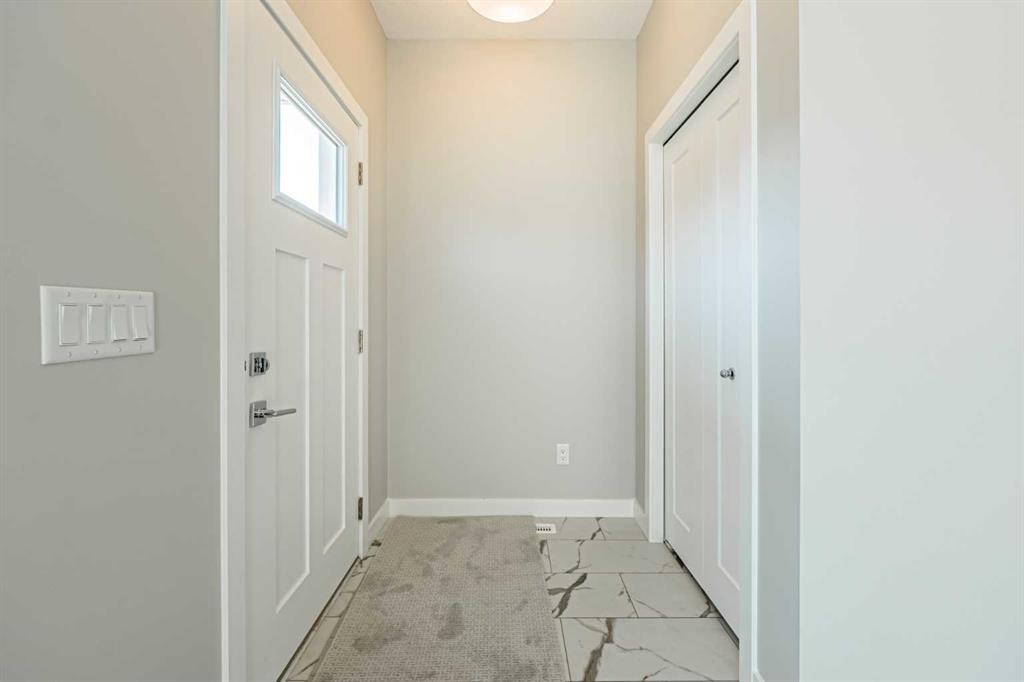 129 Dawson Wharf View, Chestermere, AB - Indoor Photo Showing Other Room