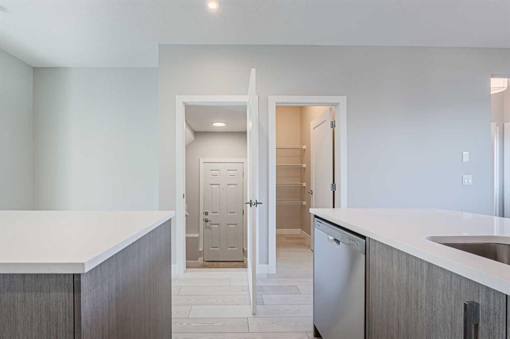 129 Dawson Wharf View, Chestermere, AB - Indoor Photo Showing Kitchen