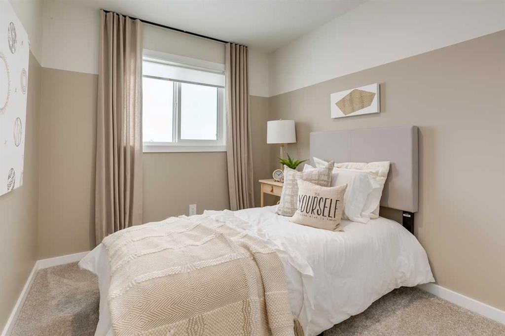 62 Starling Boulevard Nw, Calgary, AB - Indoor Photo Showing Bedroom