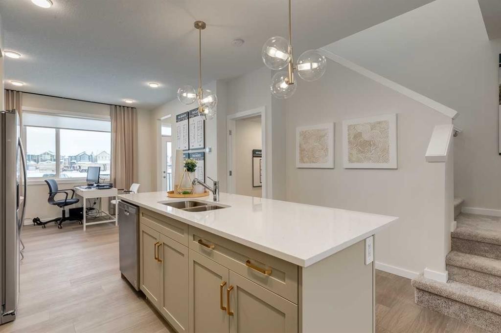 62 Starling Boulevard Nw, Calgary, AB - Indoor Photo Showing Kitchen With Double Sink
