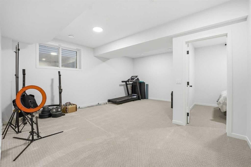 102 Setonstone Manor Se, Calgary, AB - Indoor Photo Showing Gym Room