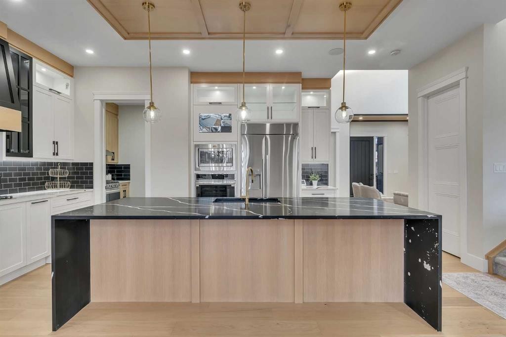 2012 Waterbury Road, Chestermere, AB - Indoor Photo Showing Kitchen With Upgraded Kitchen