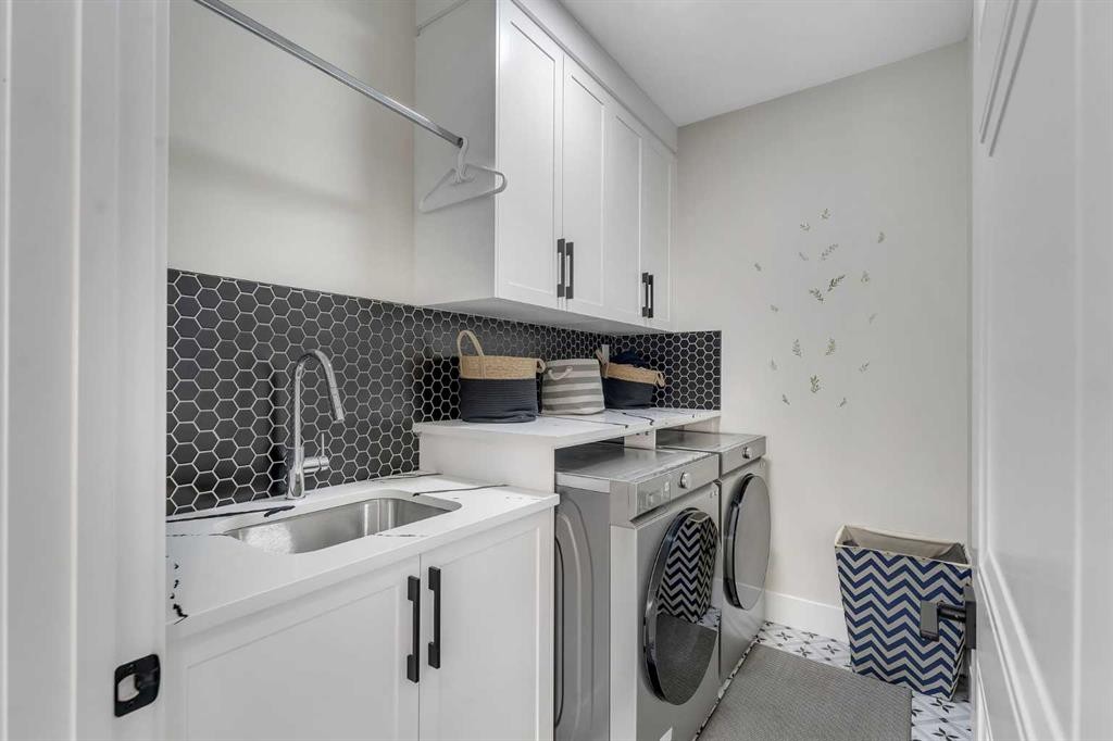 2012 Waterbury Road, Chestermere, AB - Indoor Photo Showing Laundry Room