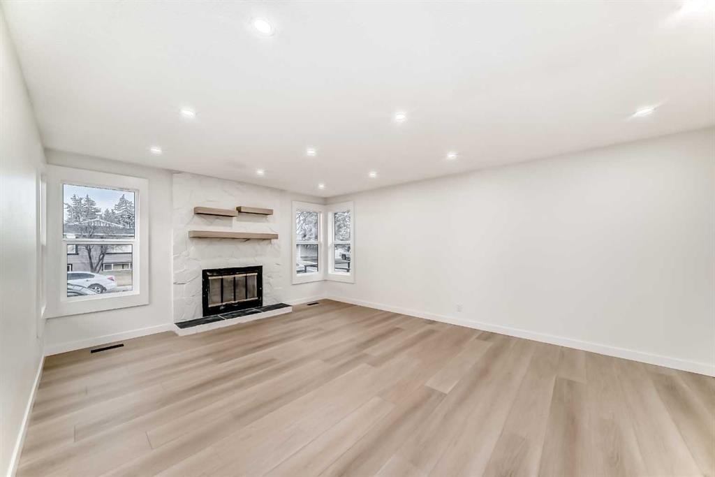 1242 Mardale Drive Ne, Calgary, AB - Indoor With Fireplace