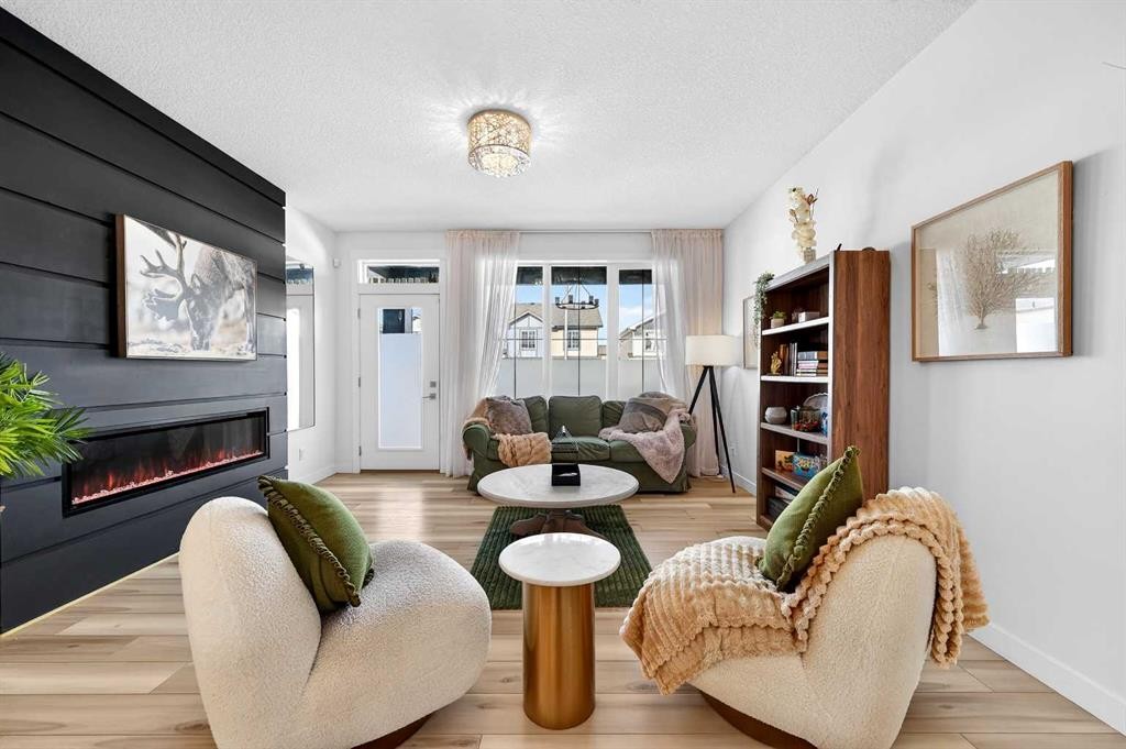 47 Walgrove Park Se, Calgary, AB - Indoor Photo Showing Living Room With Fireplace