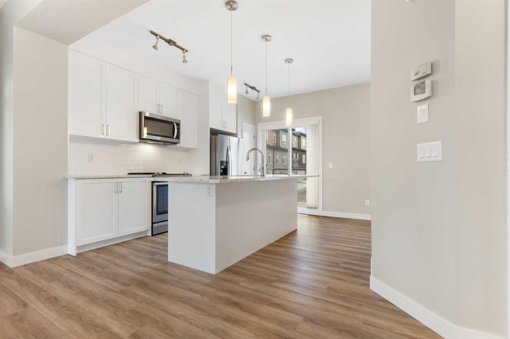 217 Sage Bluff Drive Nw, Calgary, AB - Indoor Photo Showing Kitchen With Upgraded Kitchen