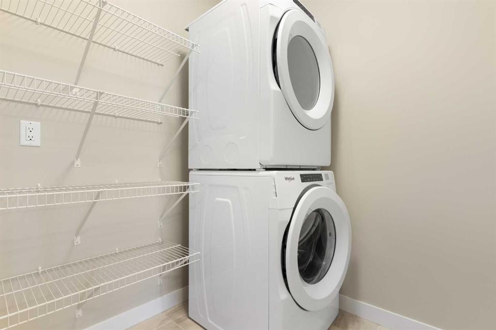 217 Sage Bluff Drive Nw, Calgary, AB - Indoor Photo Showing Laundry Room