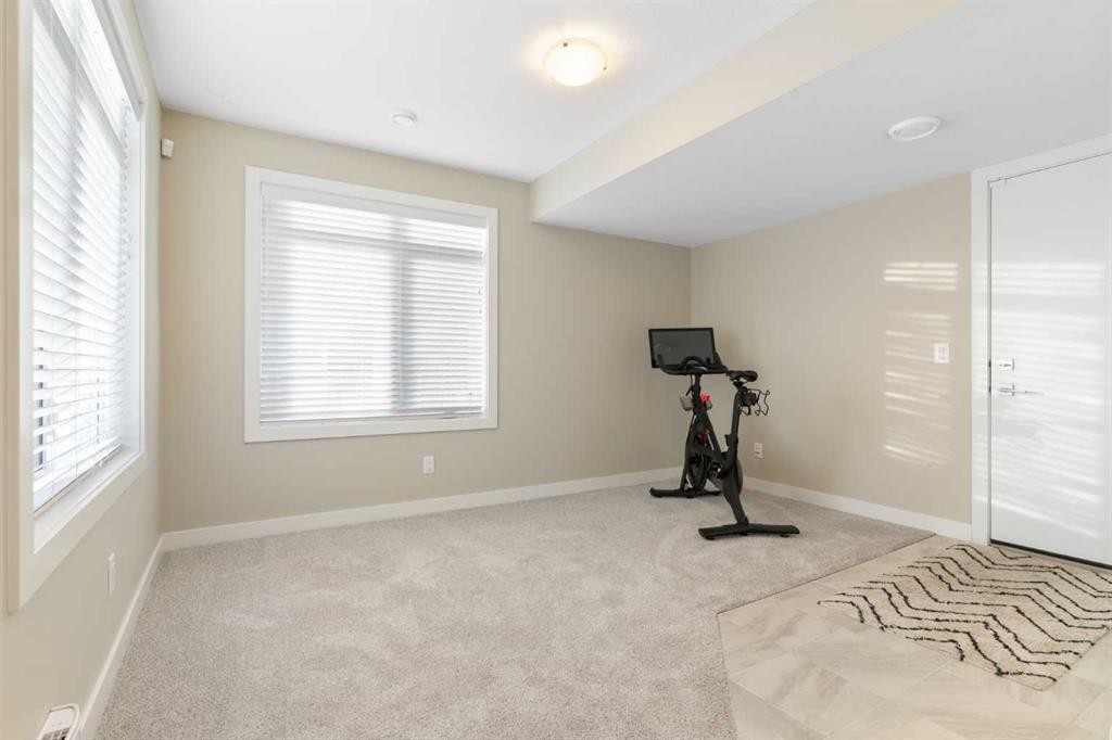 217 Sage Bluff Drive Nw, Calgary, AB - Indoor Photo Showing Gym Room