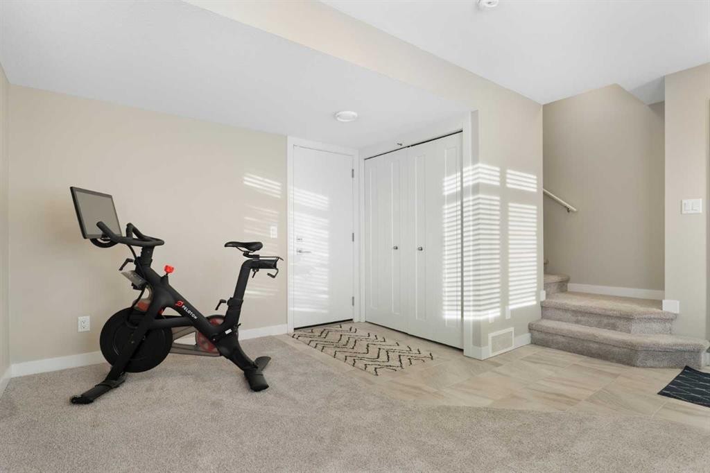 217 Sage Bluff Drive Nw, Calgary, AB - Indoor Photo Showing Gym Room