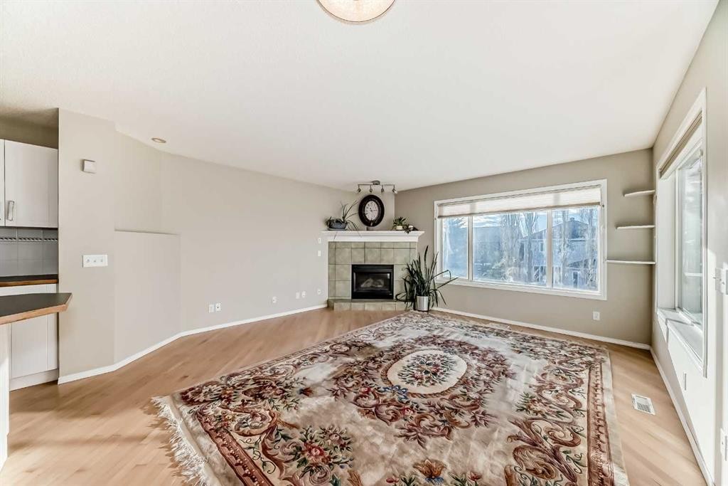 35 Citadel Ridge Close Nw, Calgary, AB - Indoor Photo Showing Living Room With Fireplace