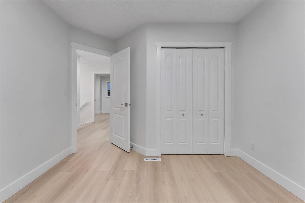 52 Saddlecreek Terrace Ne, Calgary, AB - Indoor Photo Showing Other Room
