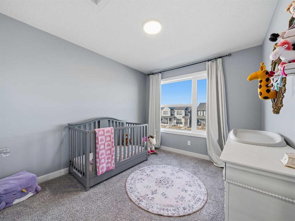 124 Highview Gate Se, Airdrie, AB - Indoor Photo Showing Bedroom