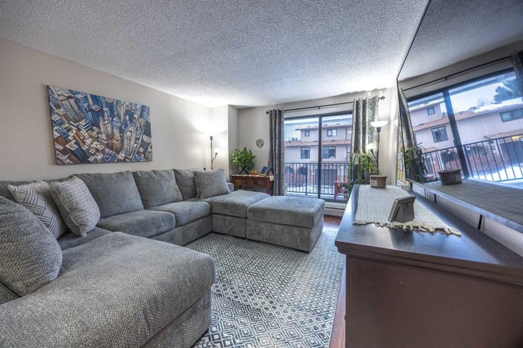 4211-13045 6 Street Sw, Calgary, AB - Indoor Photo Showing Living Room