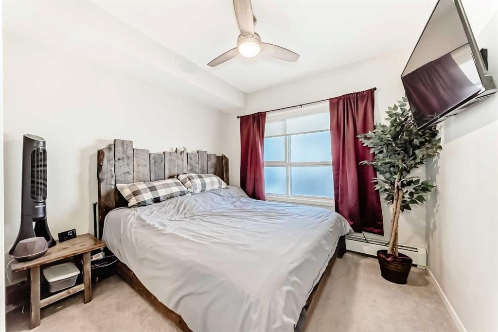 409-4150 Seton Drive Se, Calgary, AB - Indoor Photo Showing Bedroom