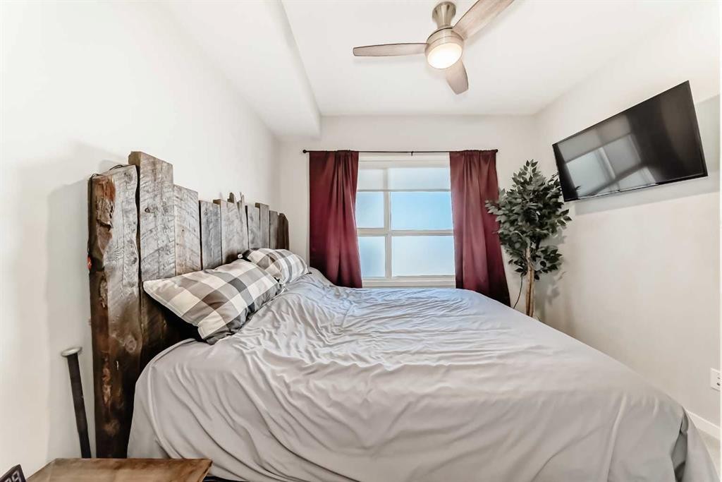 409-4150 Seton Drive Se, Calgary, AB - Indoor Photo Showing Bedroom