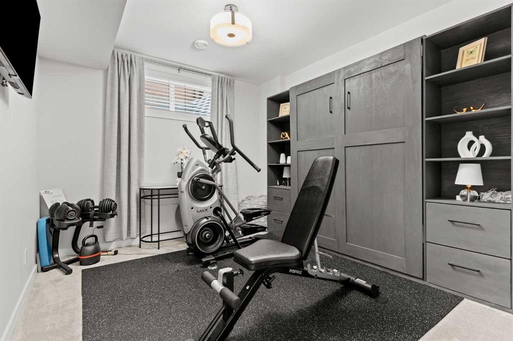47 Wolf Willow Boulevard Se, Calgary, AB - Indoor Photo Showing Gym Room
