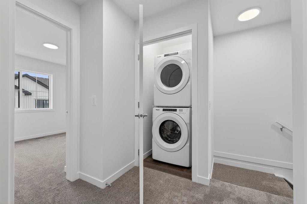 56 Creekside Drive Sw, Calgary, AB - Indoor Photo Showing Laundry Room