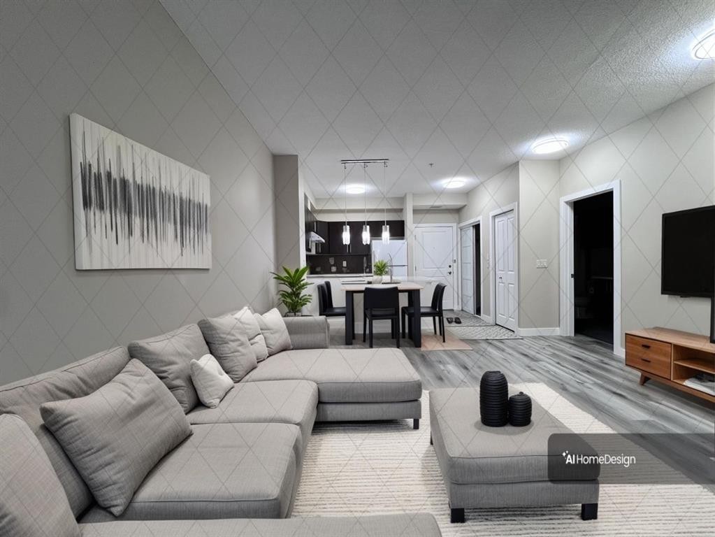 104-2727 28 Avenue Se, Calgary, AB - Indoor Photo Showing Living Room