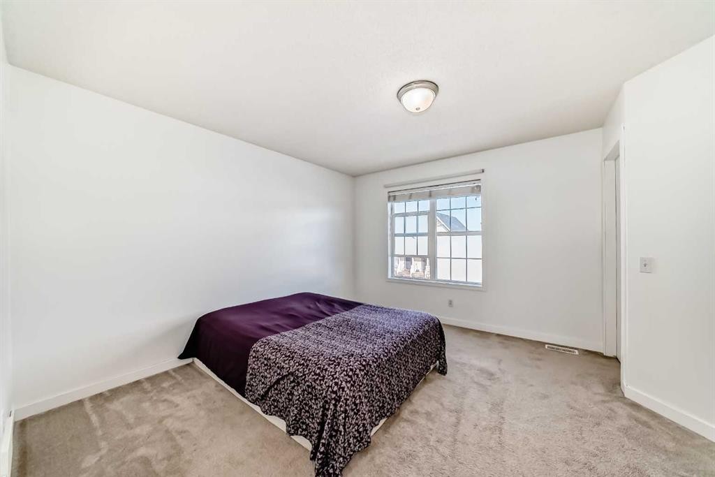 294 Elgin View Se, Calgary, AB - Indoor Photo Showing Bedroom