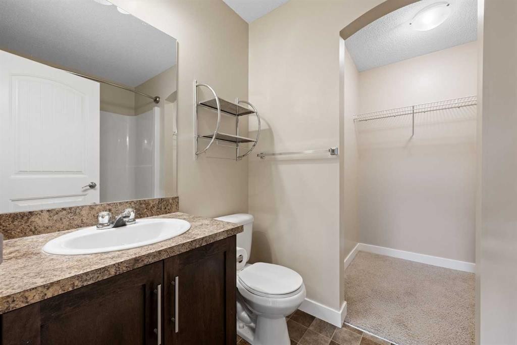 2203-230 Eversyde Boulevard Sw, Calgary, AB - Indoor Photo Showing Bathroom