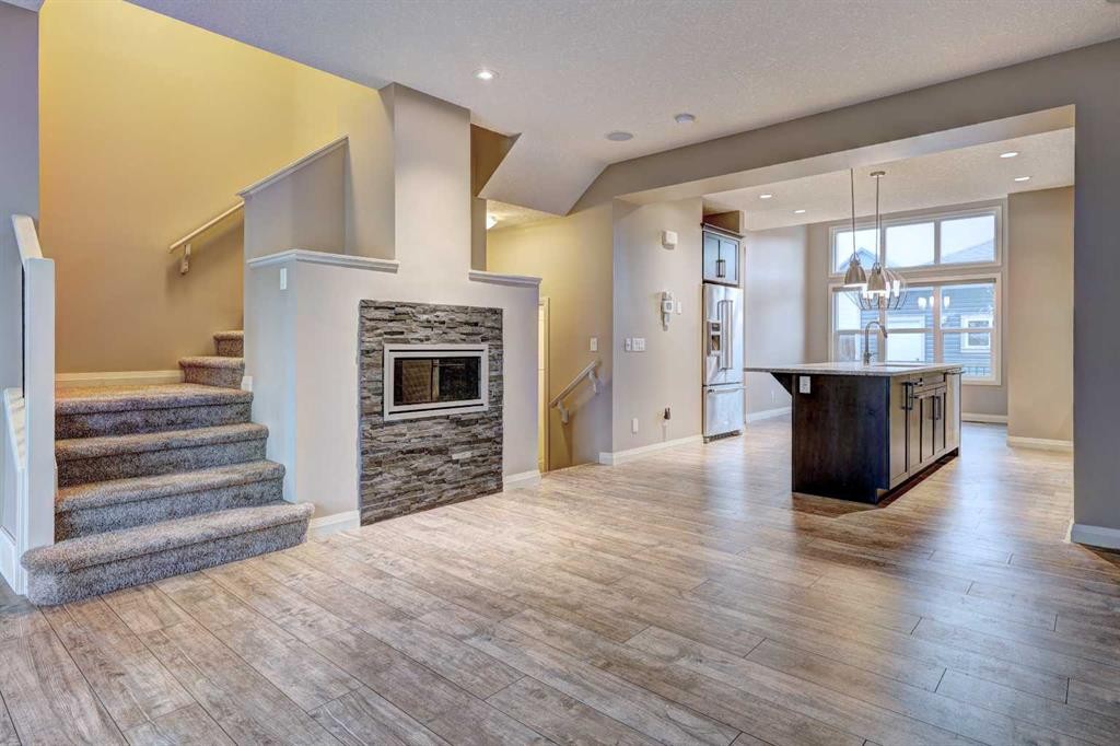 70 Masters Crescent Se, Calgary, AB - Indoor With Fireplace