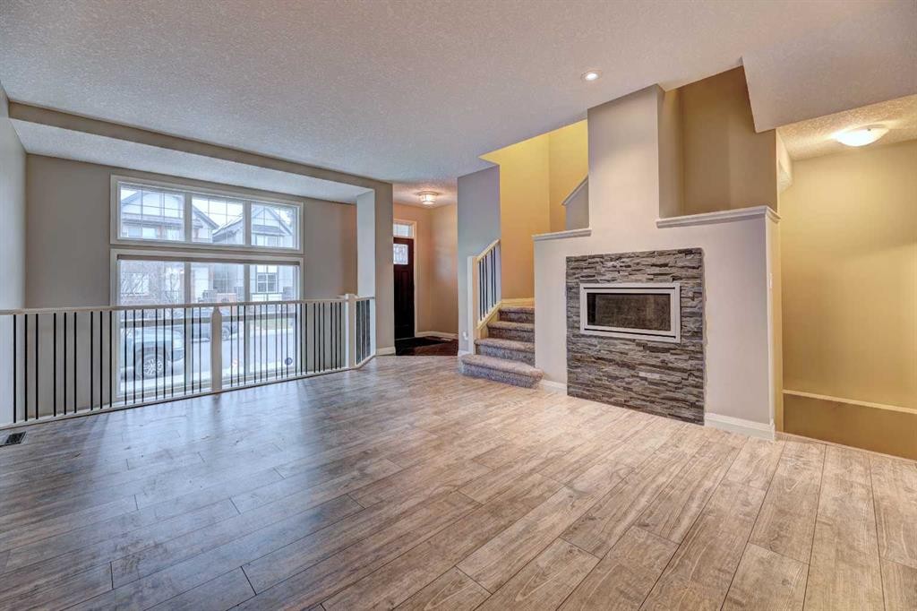 70 Masters Crescent Se, Calgary, AB - Indoor With Fireplace